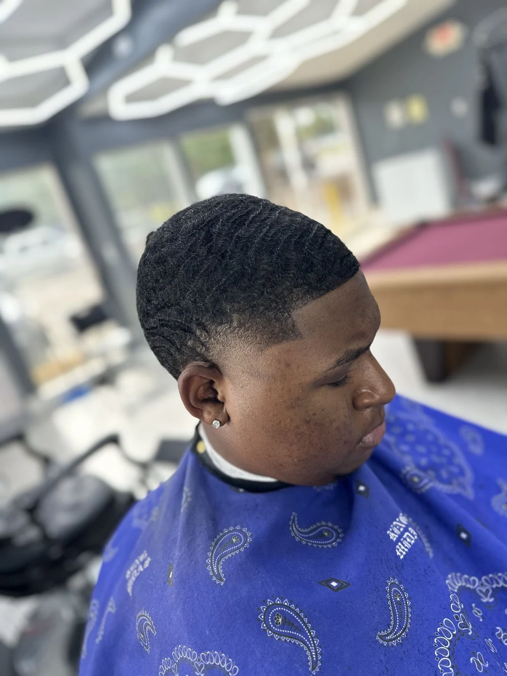 Finished haircut with waves and a sharp hairline from TrejoFades’ portfolio